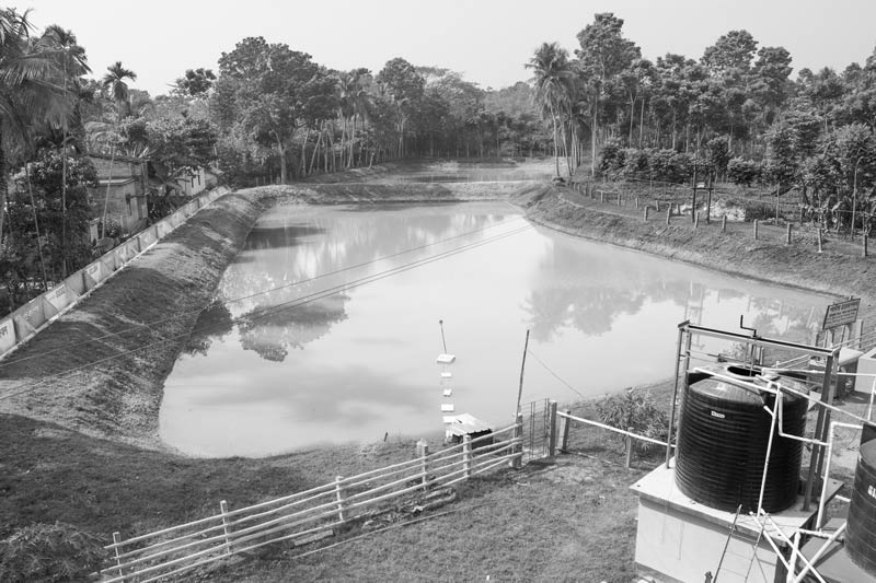 Sulabh Safe Drinking Water project in Arsenic-Affected Areas - the drinking water pond along with a part of the water treatment plant in village Madhusudankati, North 24 parganas district, West Bengal